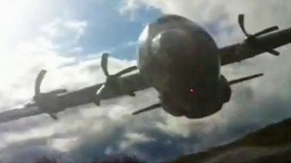 Look At This C-130 Hercules Do A Crazy-Ass Low Level Flyby In Alaska